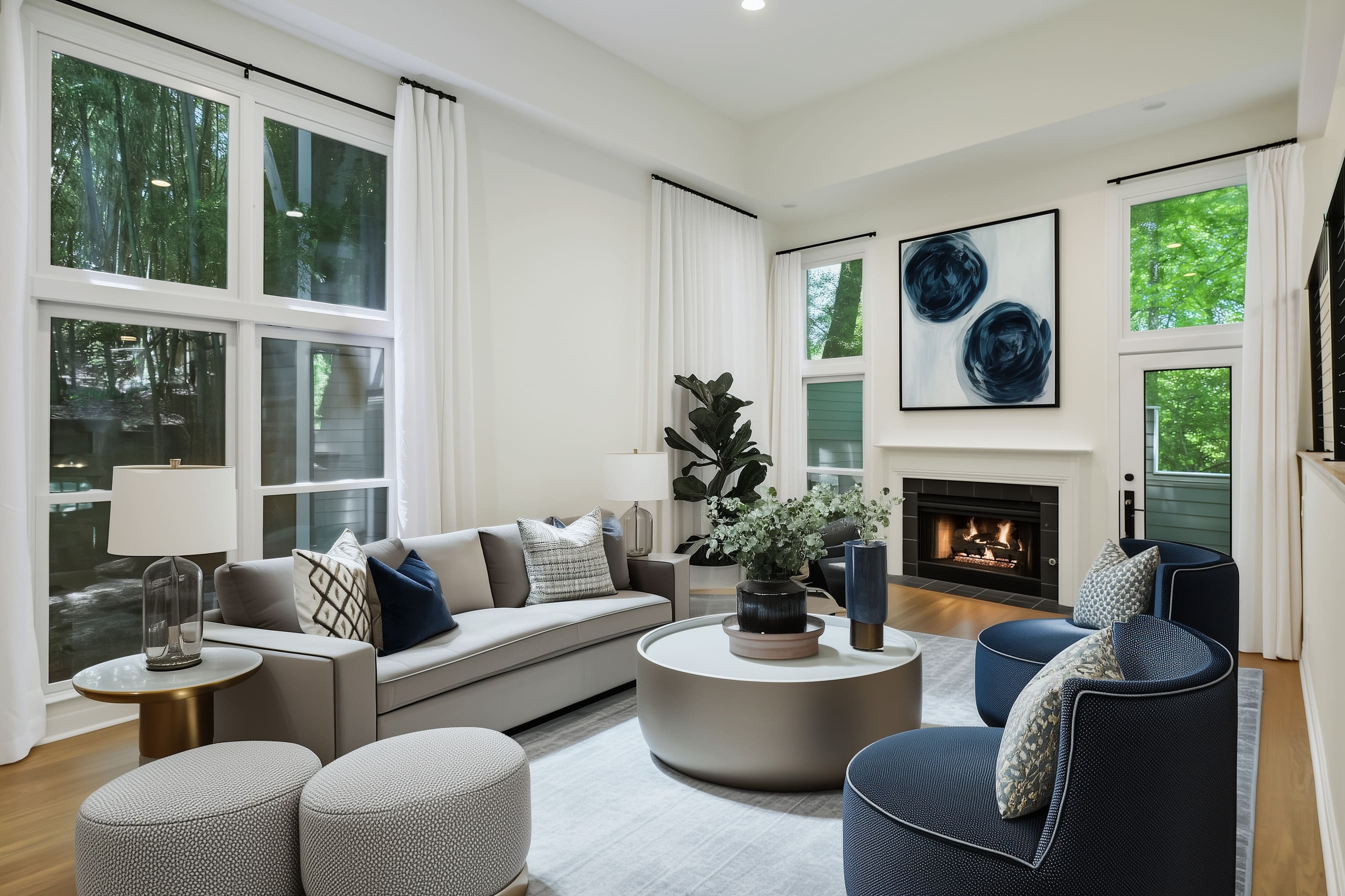 A tailored gray sofa with sharp lines forms the backbone of the seating arrangement